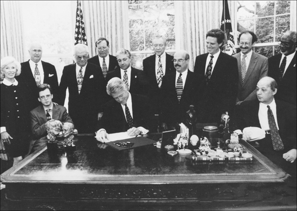 2000 Bill Clinton Signs TBI Act